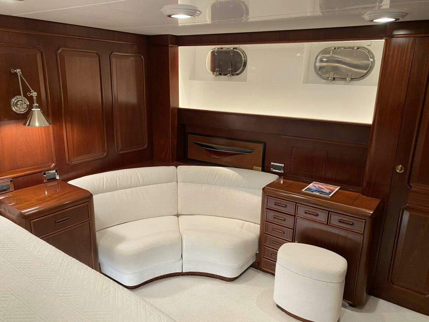 a room with a bed and cabinets aboard PRECIOUS CARGO Yacht for Sale