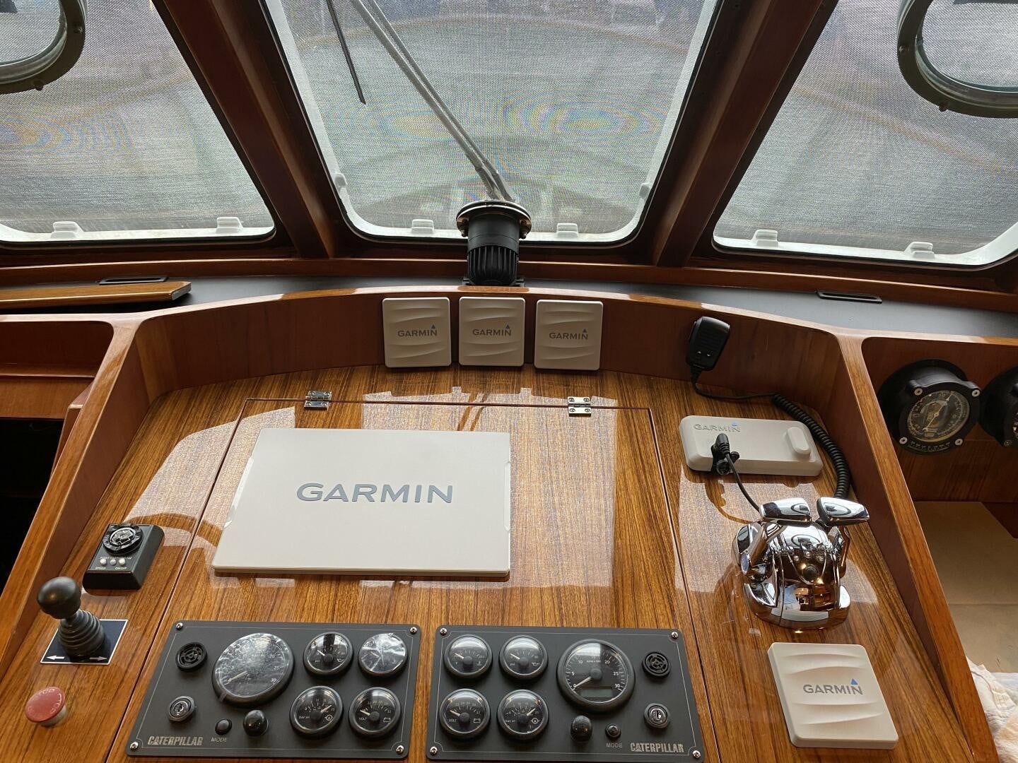 a wooden table with a typewriter and a box on it aboard PRECIOUS CARGO Yacht for Sale