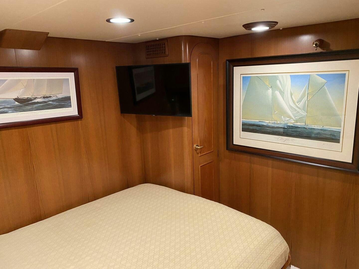 a bed in a room aboard PRECIOUS CARGO Yacht for Sale