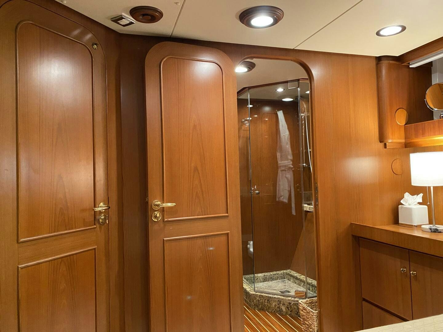a bathroom with a glass shower aboard PRECIOUS CARGO Yacht for Sale