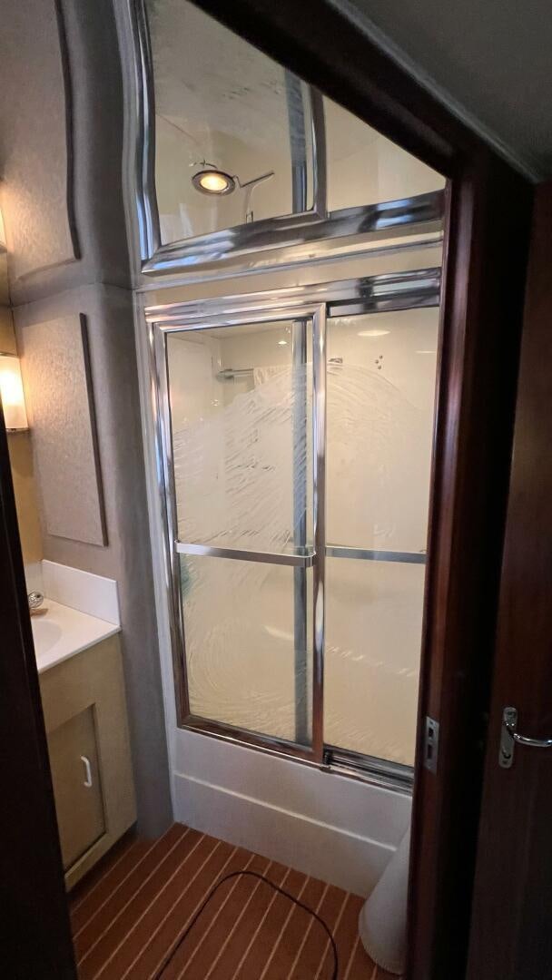 a shower unit in a bathroom aboard SEA OWL Yacht for Sale