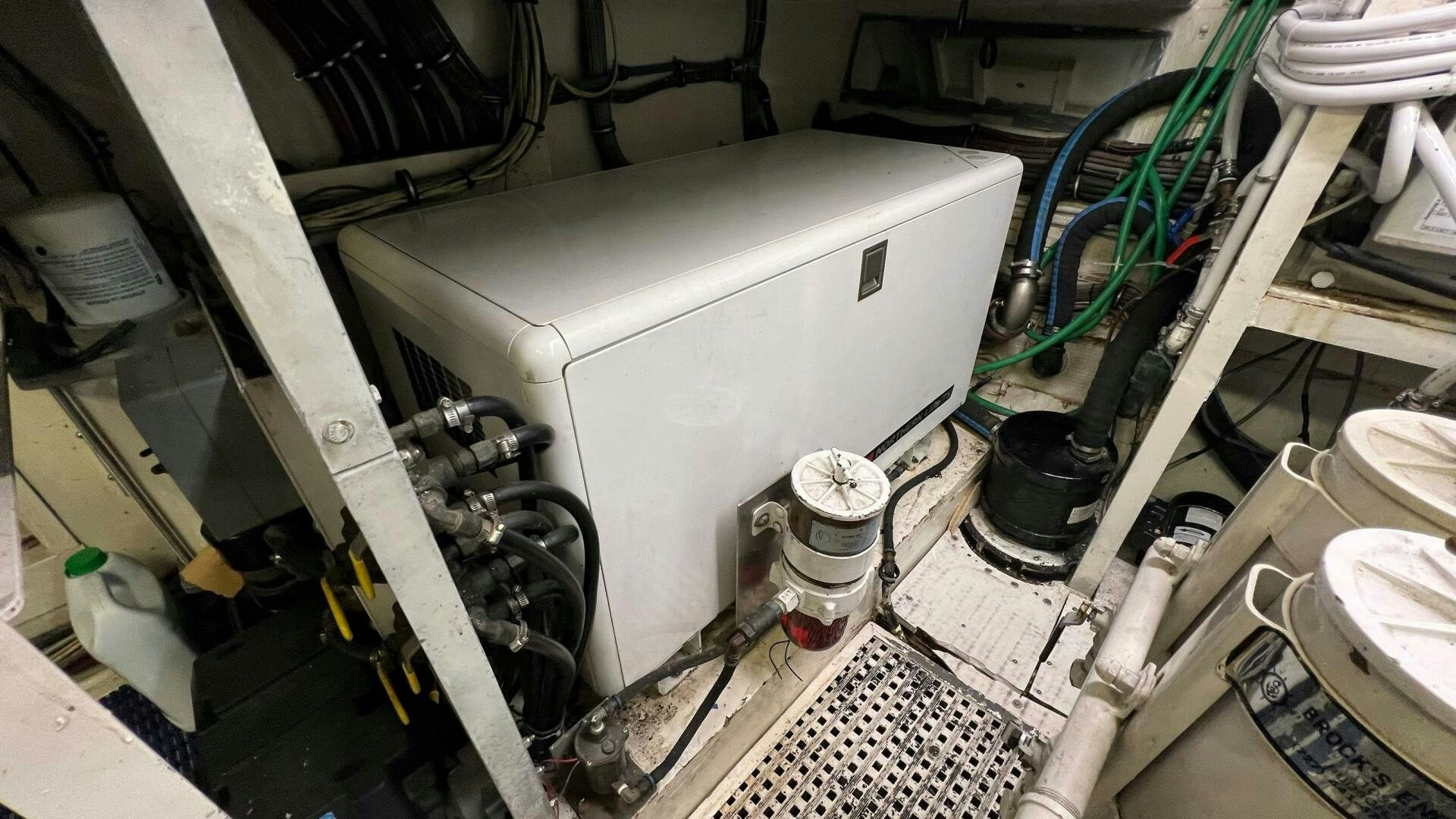 a machine with a large piece of equipment in it aboard SEA OWL Yacht for Sale