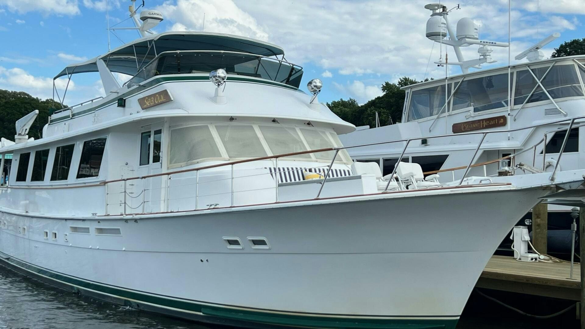 a couple of boats docked aboard SEA OWL Yacht for Sale