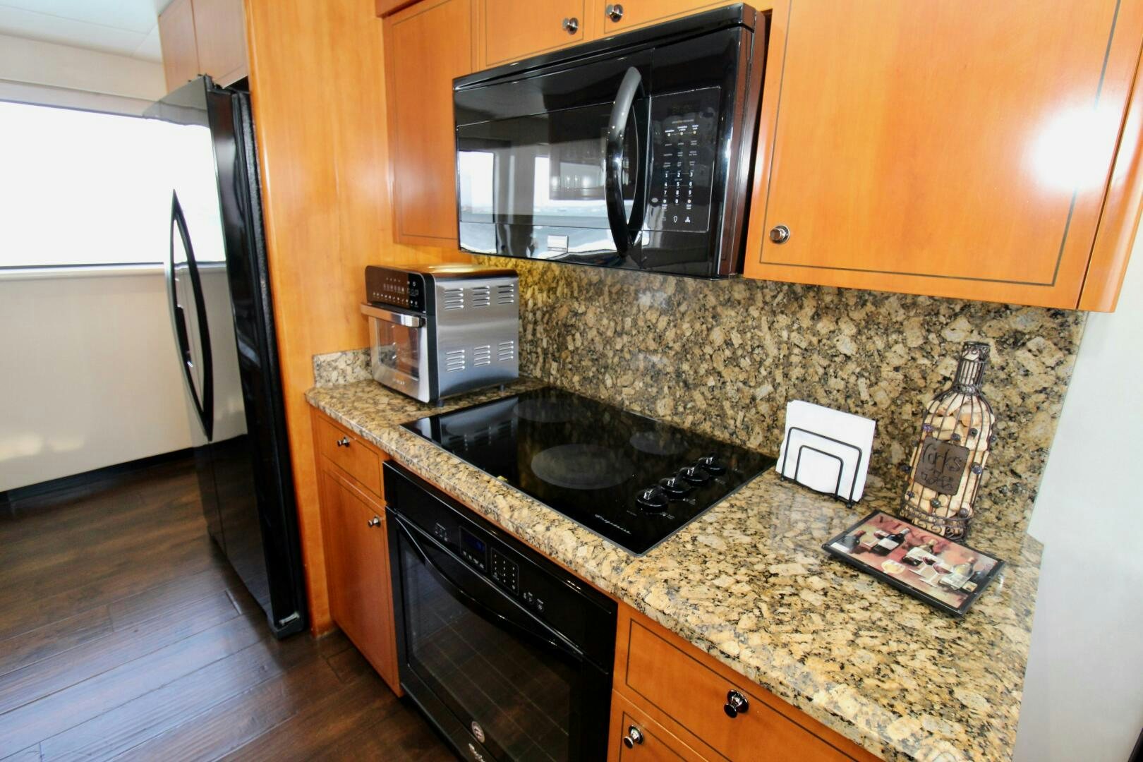 a kitchen with granite counter tops aboard MY WAY Yacht for Sale