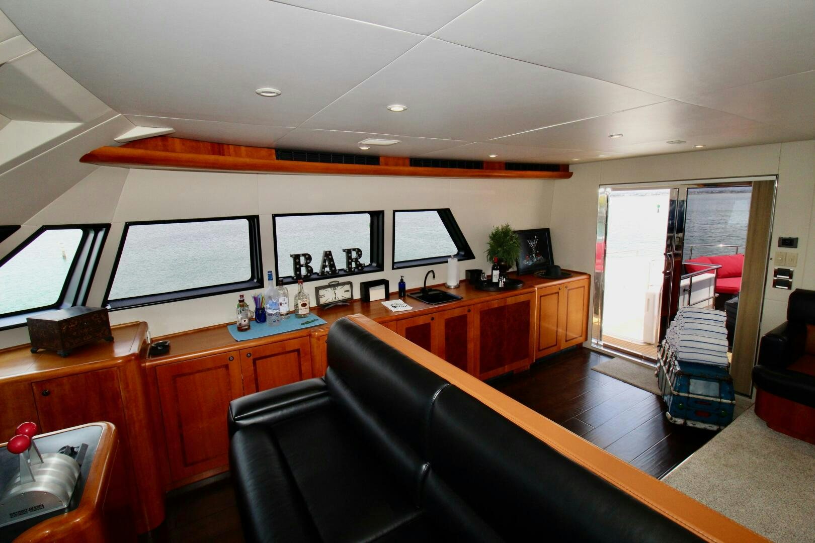 a room with a desk and chairs aboard MY WAY Yacht for Sale