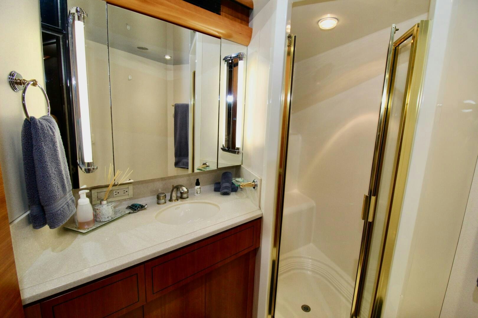 a bathroom with a sink and a mirror aboard MY WAY Yacht for Sale