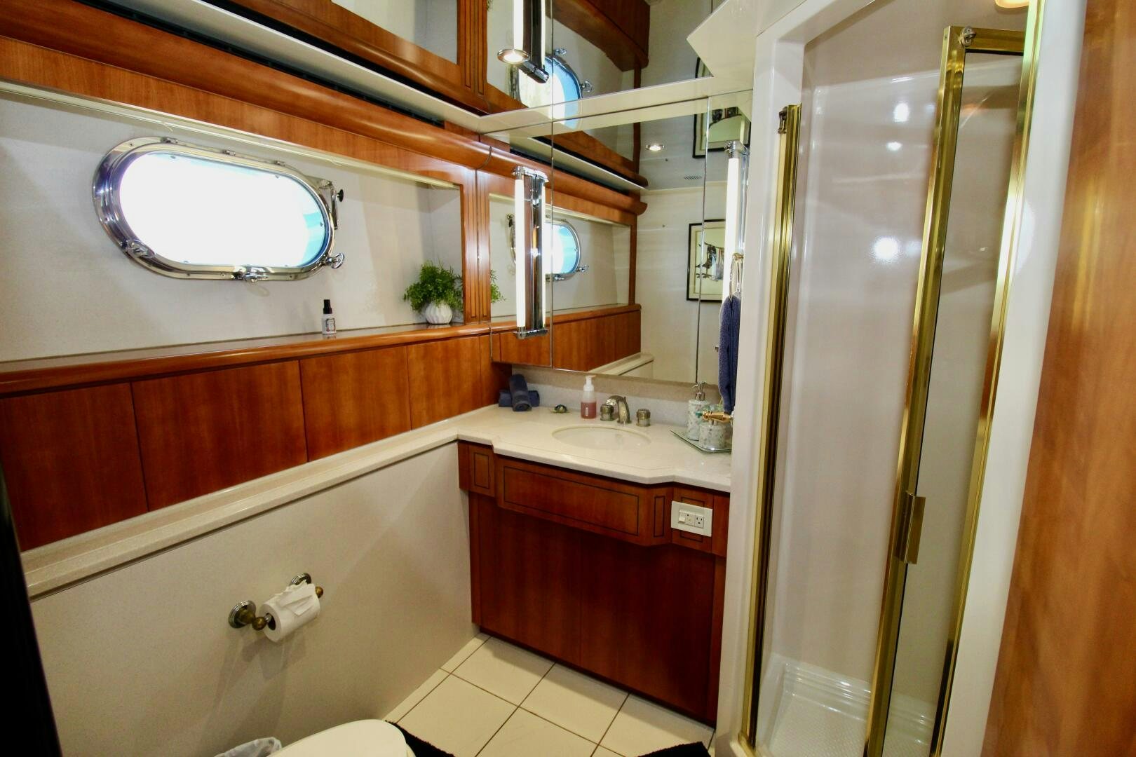 a bathroom with a glass shower aboard MY WAY Yacht for Sale
