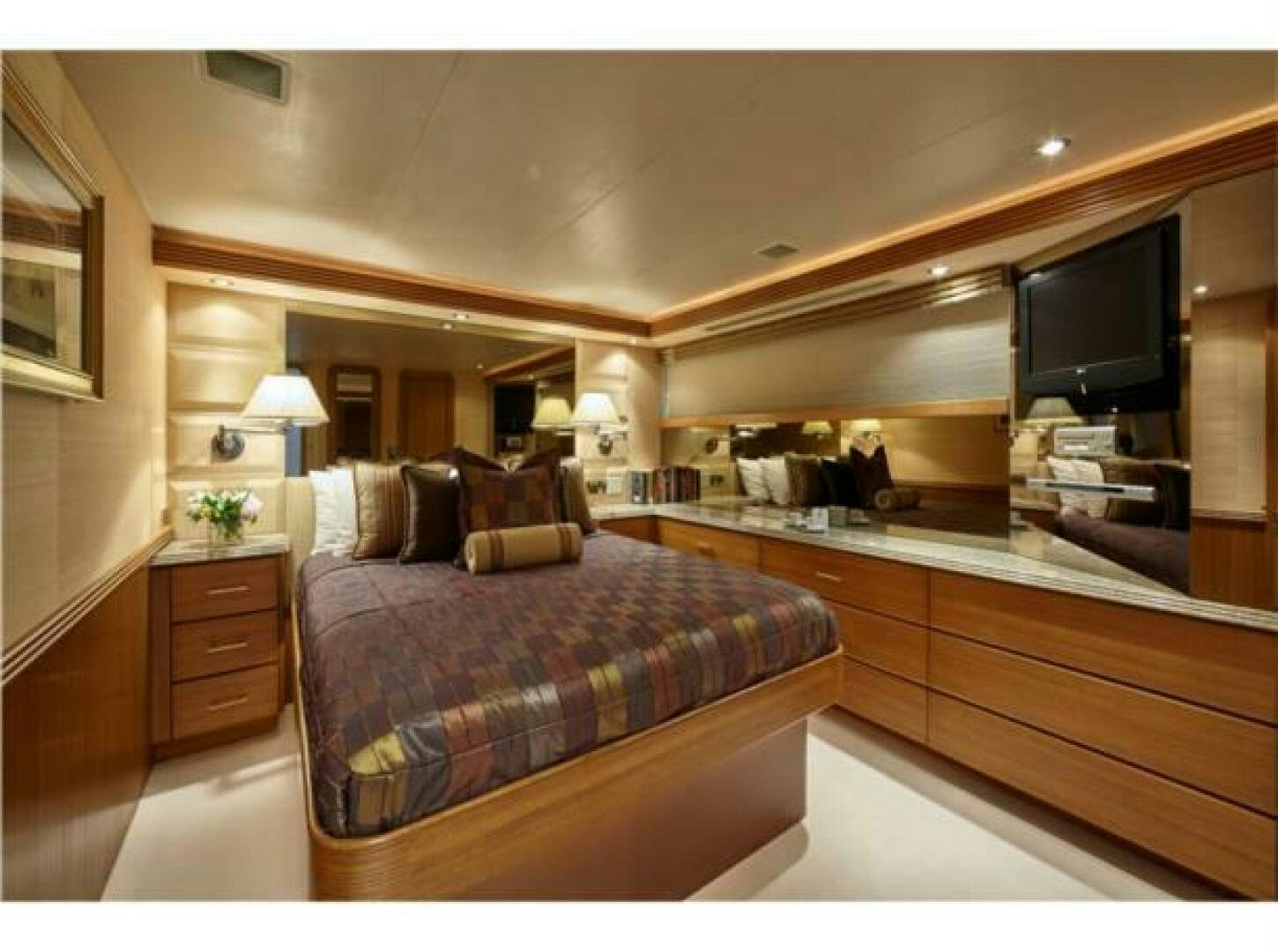 a bedroom with a large bed aboard INTEGRITY Yacht for Sale