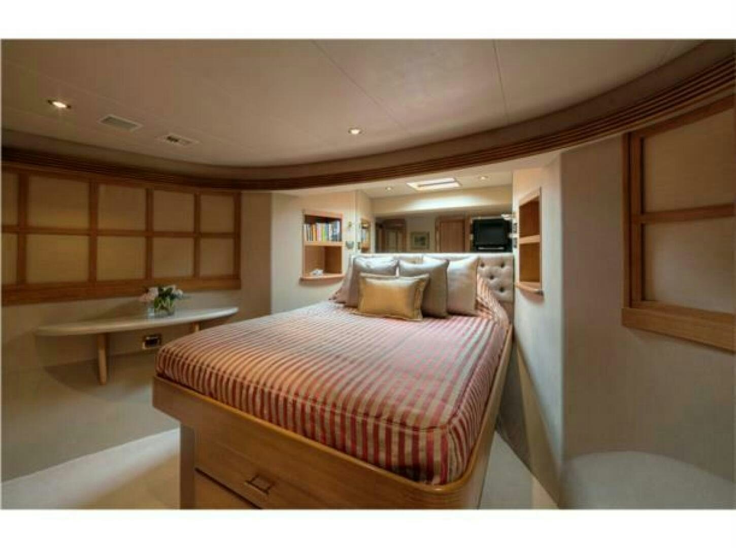 a bed in a room aboard INTEGRITY Yacht for Sale