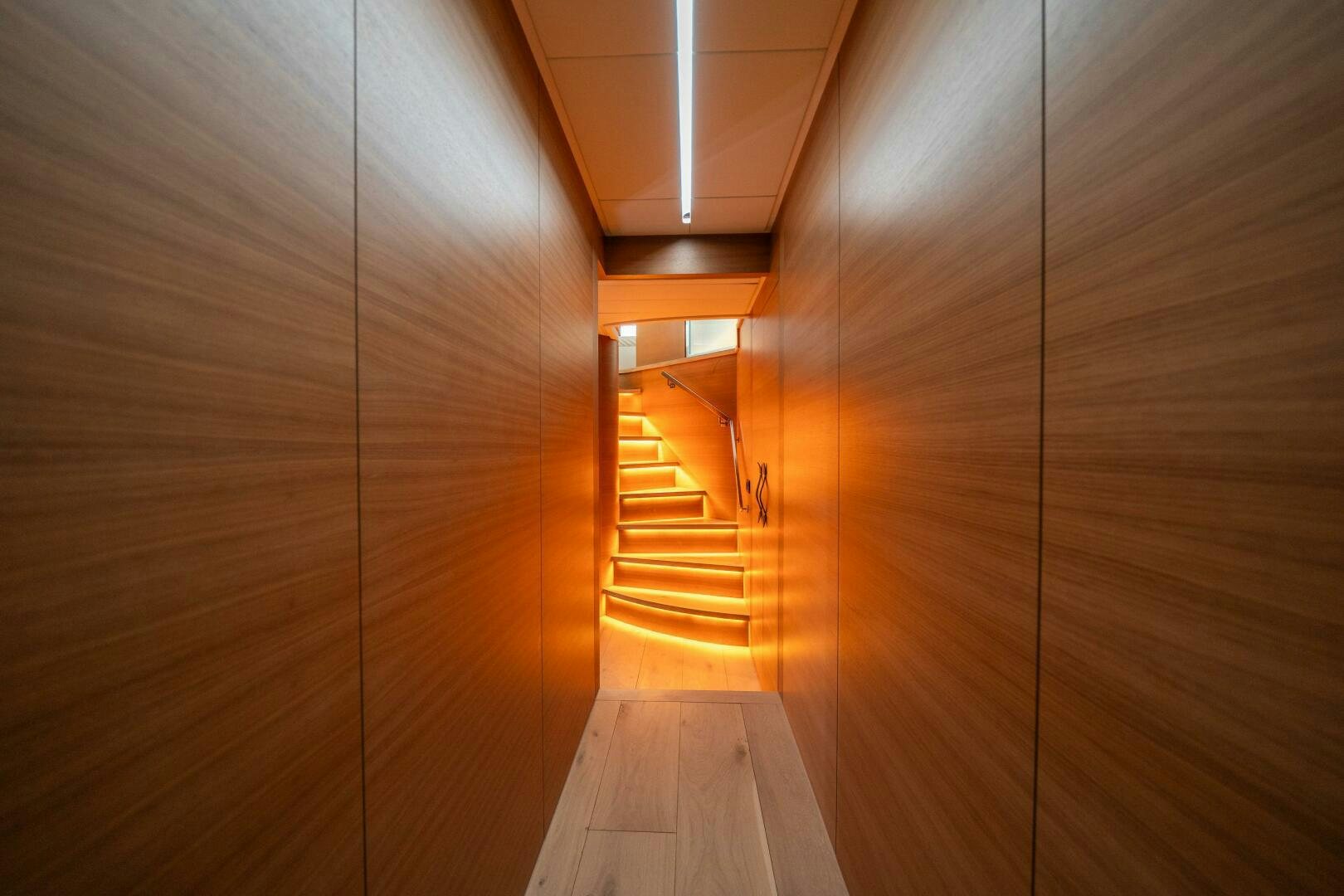a wooden hallway with a wood floor aboard INCOGNITO Yacht for Sale