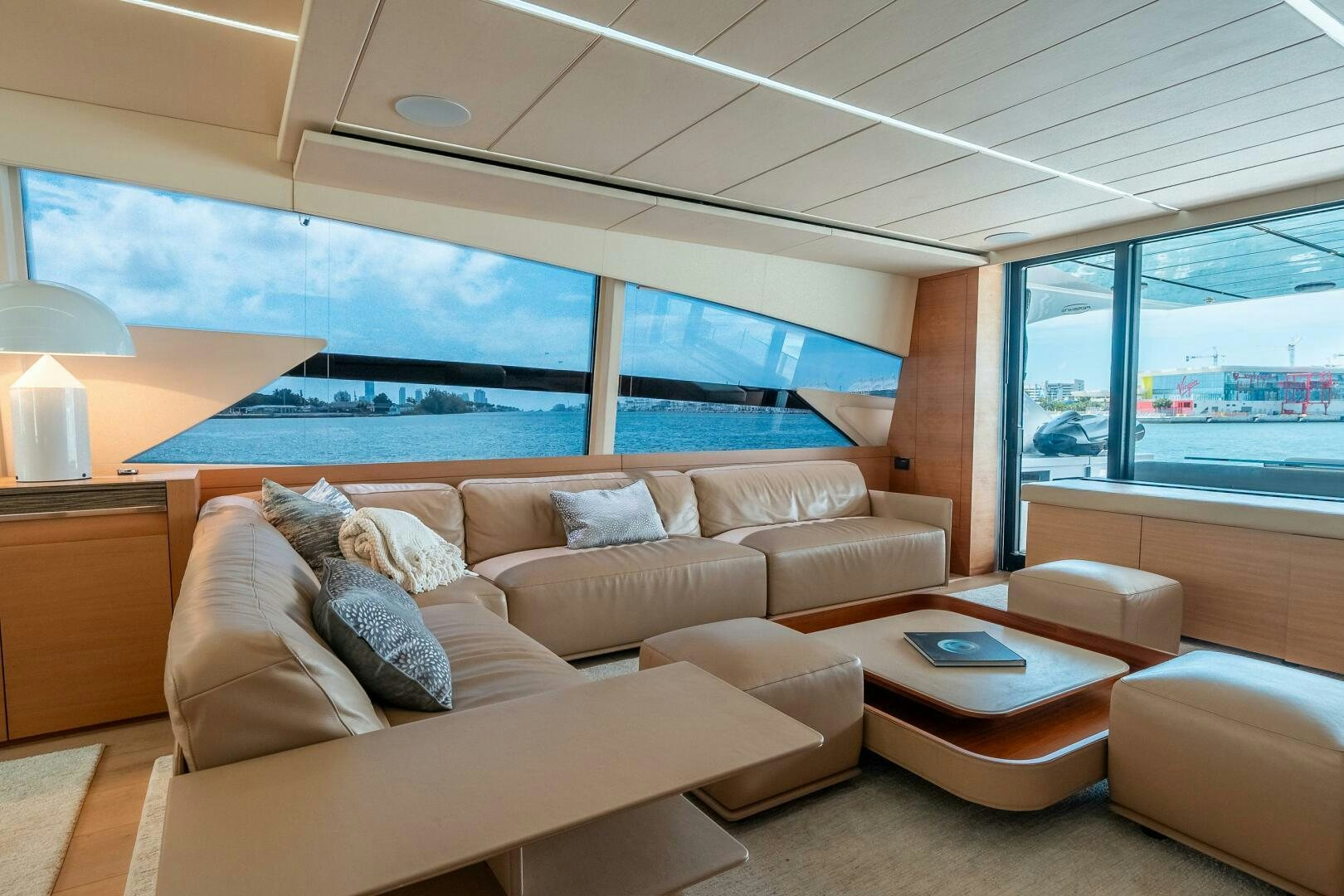 a living room with a large window aboard INCOGNITO Yacht for Sale