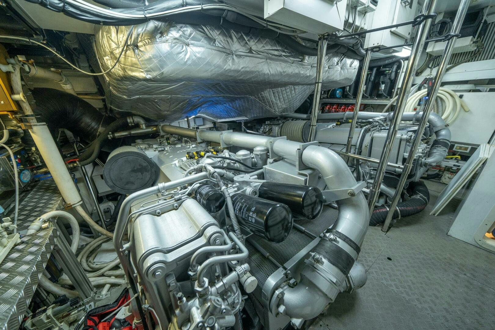 a car engine with a hood aboard INCOGNITO Yacht for Sale