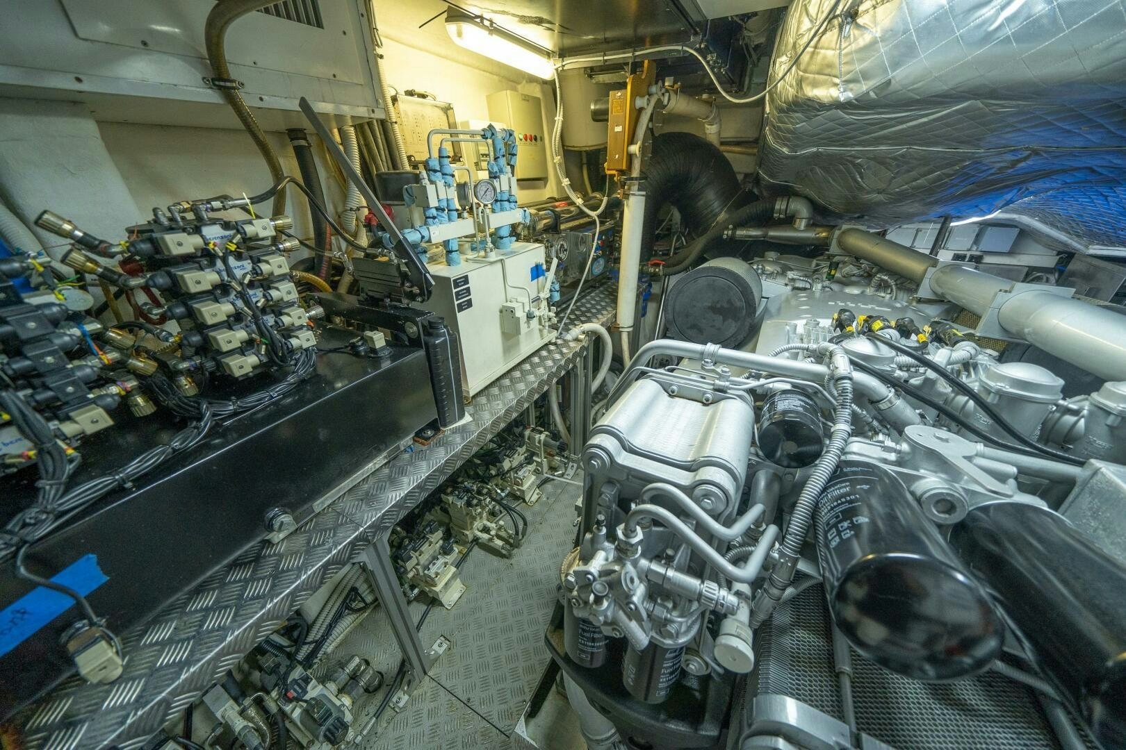 a large room with machinery aboard INCOGNITO Yacht for Sale
