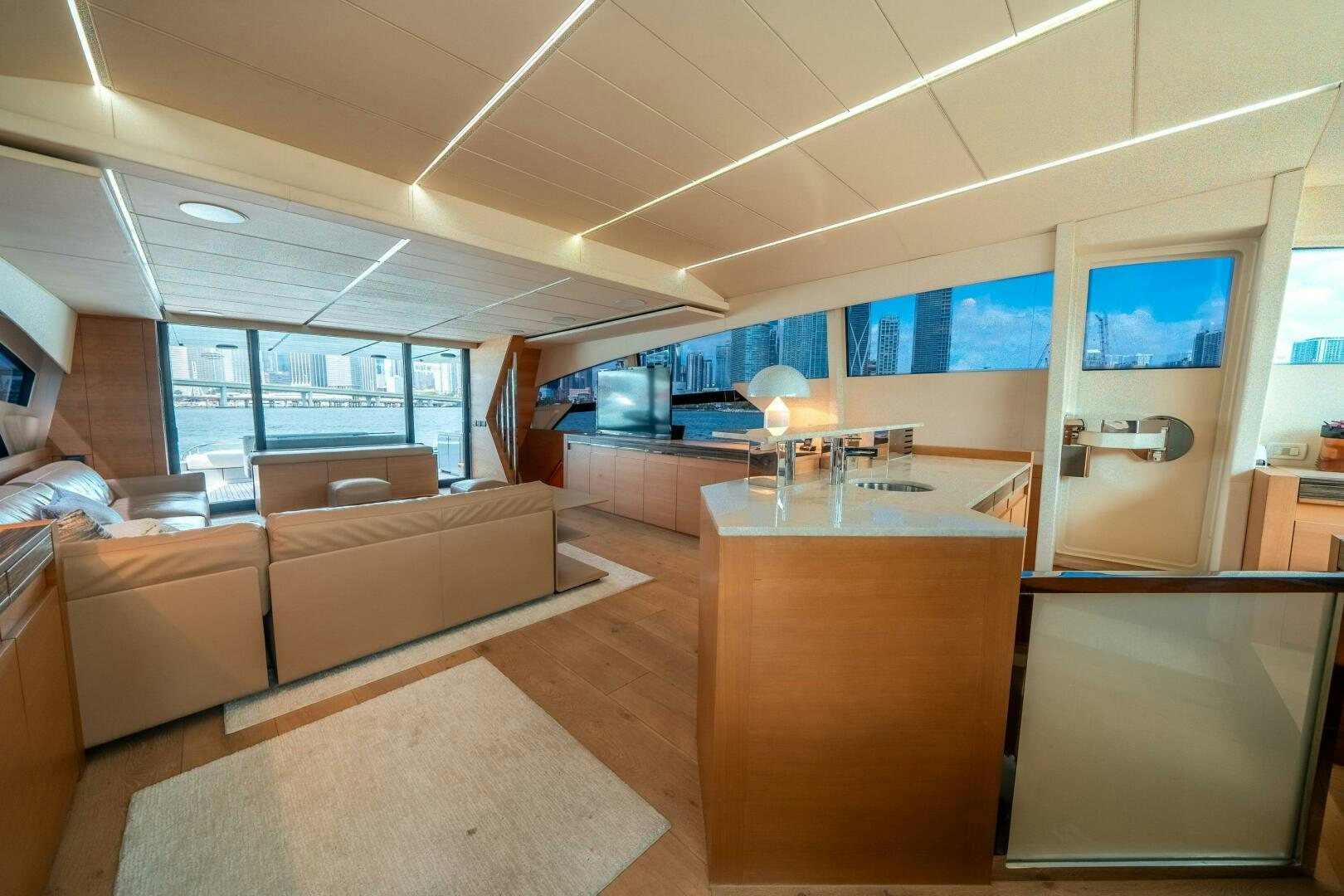 a room with a couch and a table aboard INCOGNITO Yacht for Sale
