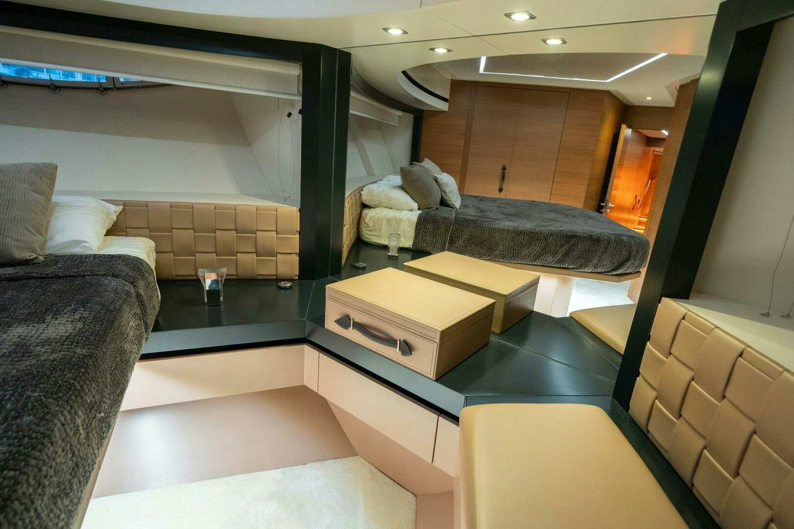 a room with a bed and a couch aboard INCOGNITO Yacht for Sale