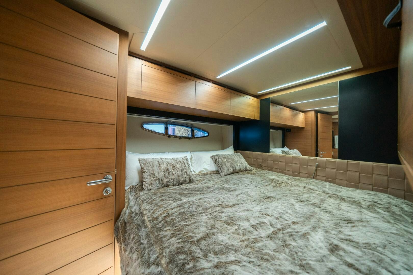 a bed in a room aboard INCOGNITO Yacht for Sale
