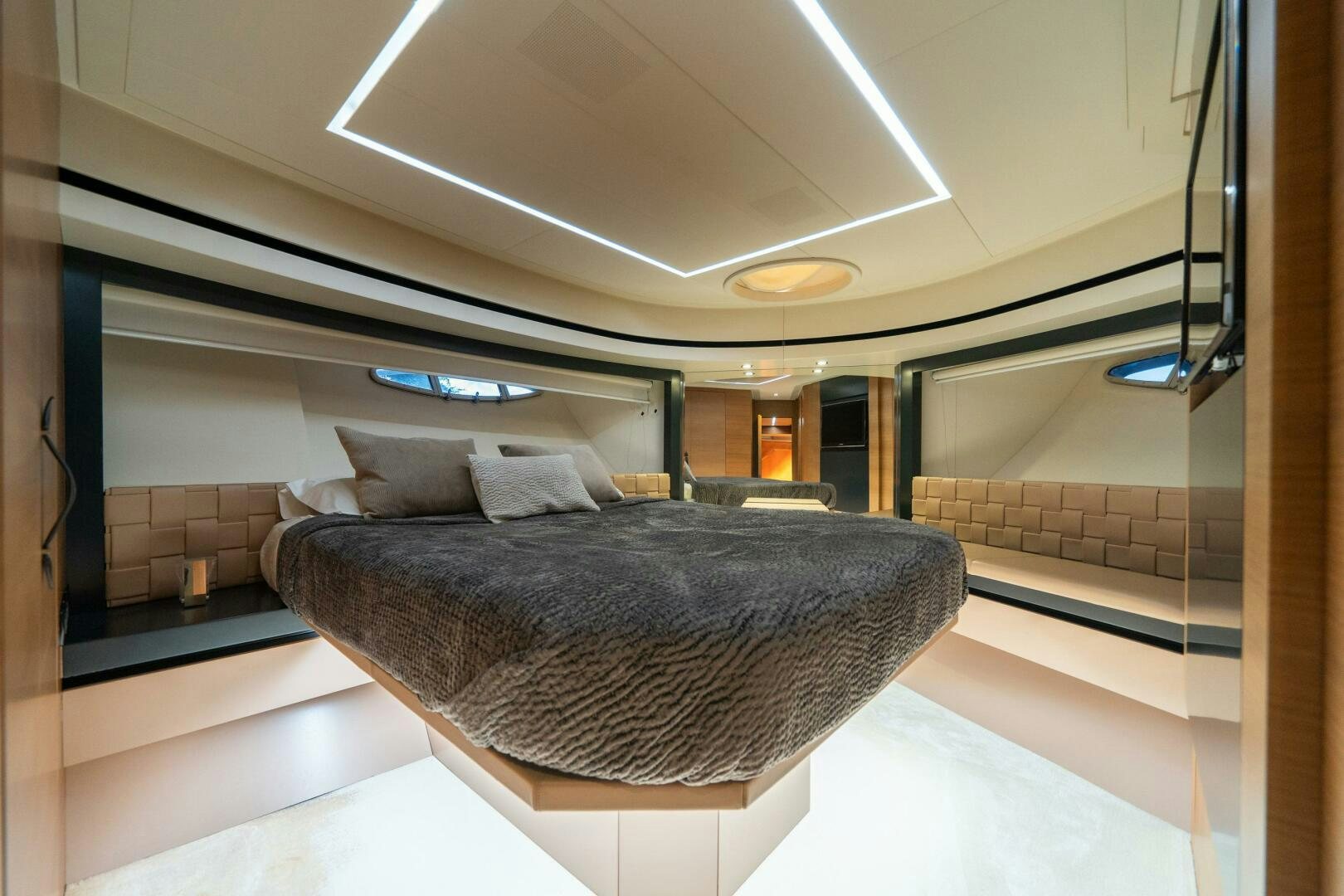 a large bed in a room aboard INCOGNITO Yacht for Sale