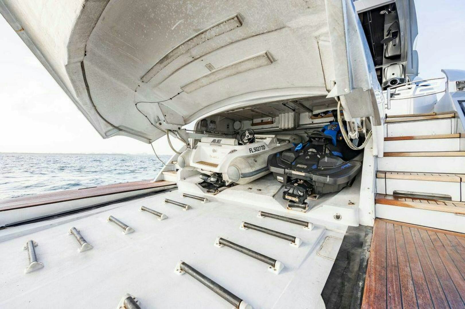 a large white boat with a large white boat in the water aboard INCOGNITO Yacht for Sale