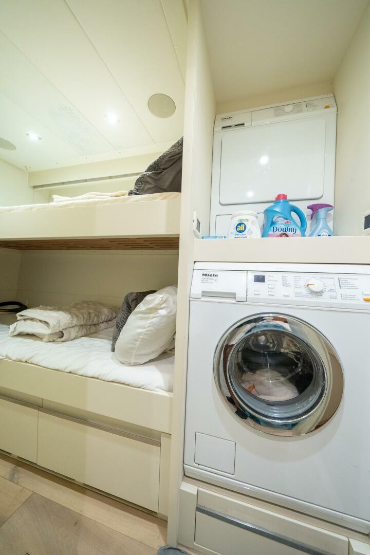 a washing machine in a room aboard INCOGNITO Yacht for Sale