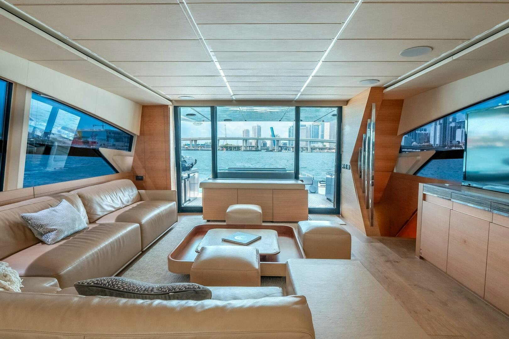 a living room with a large window aboard INCOGNITO Yacht for Sale