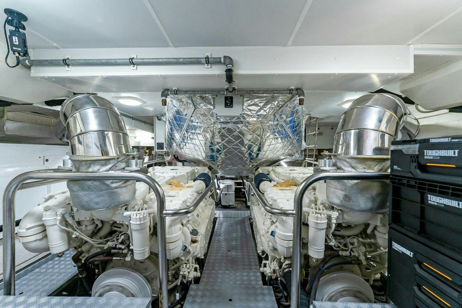 a room with several machines aboard LIMITLESS Yacht for Sale