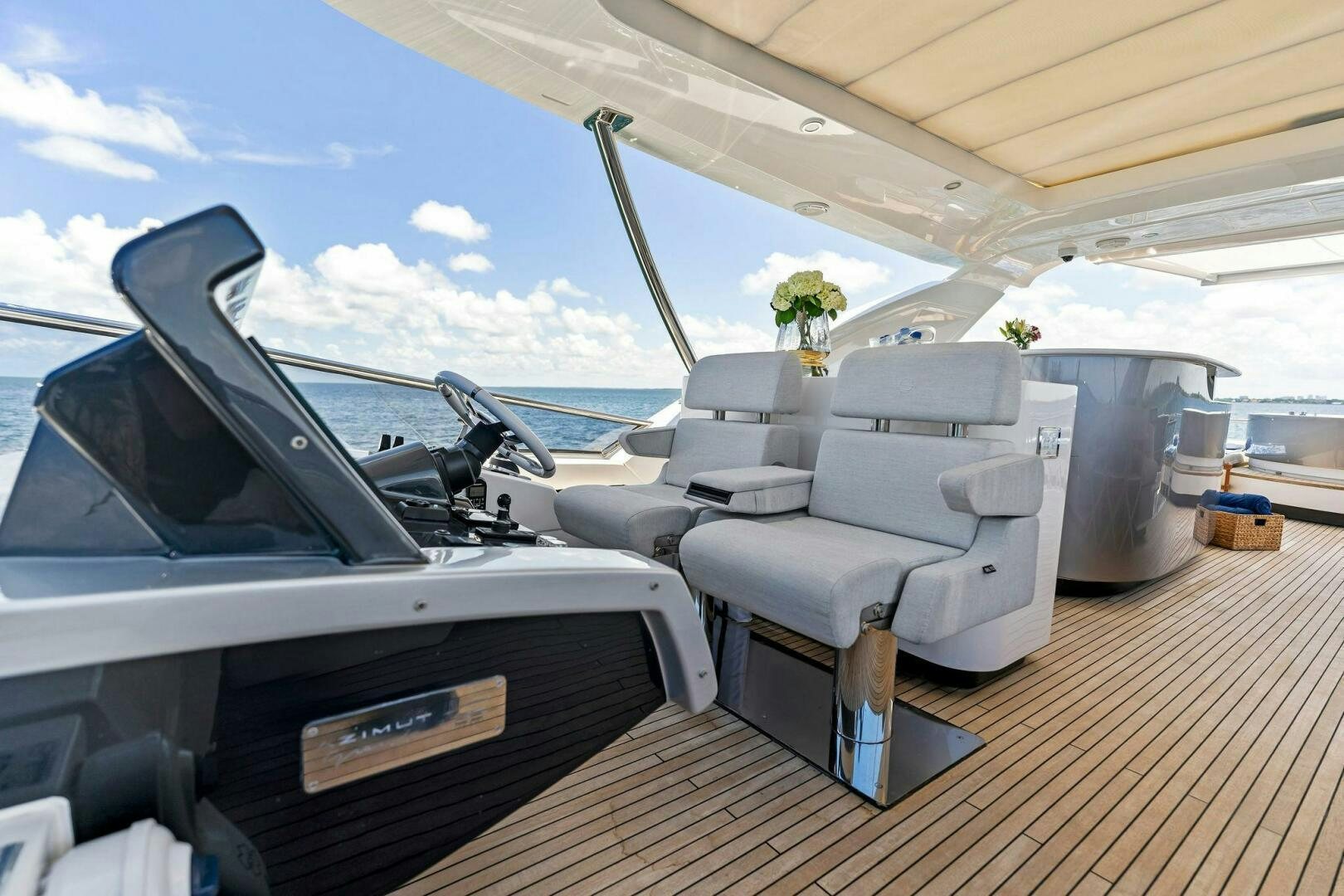 the inside of a car aboard LIMITLESS Yacht for Sale