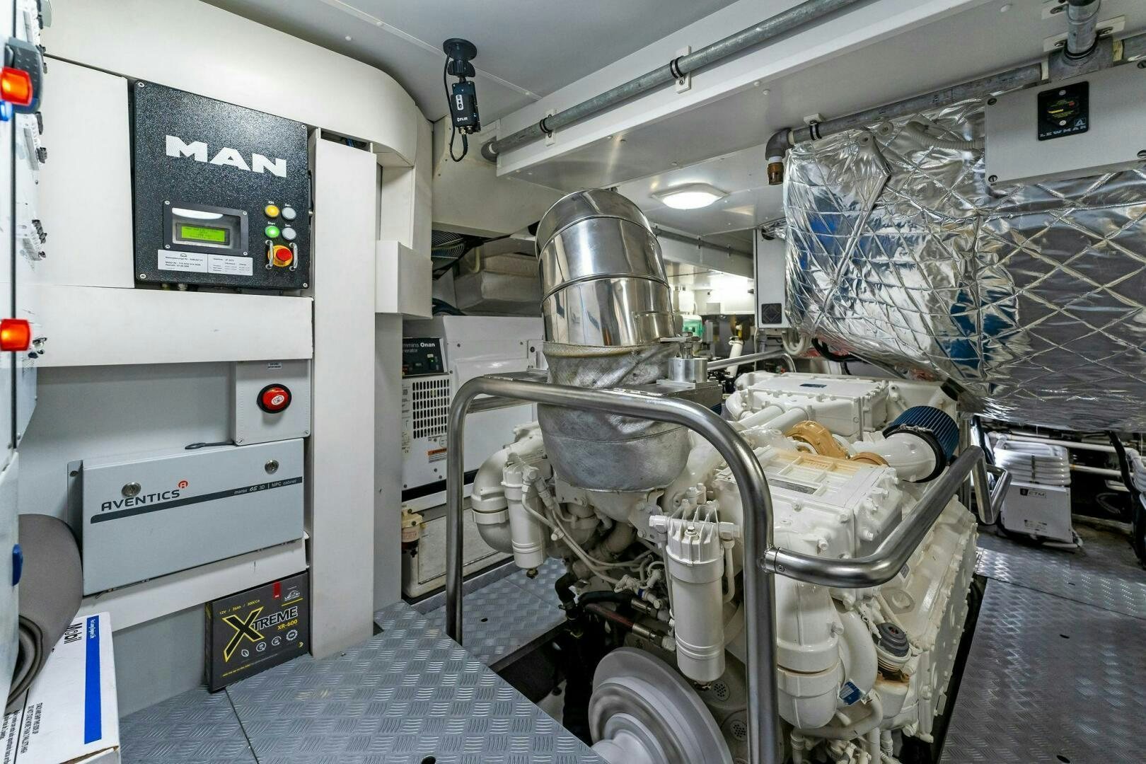 a machine with a large metal cylinder aboard LIMITLESS Yacht for Sale