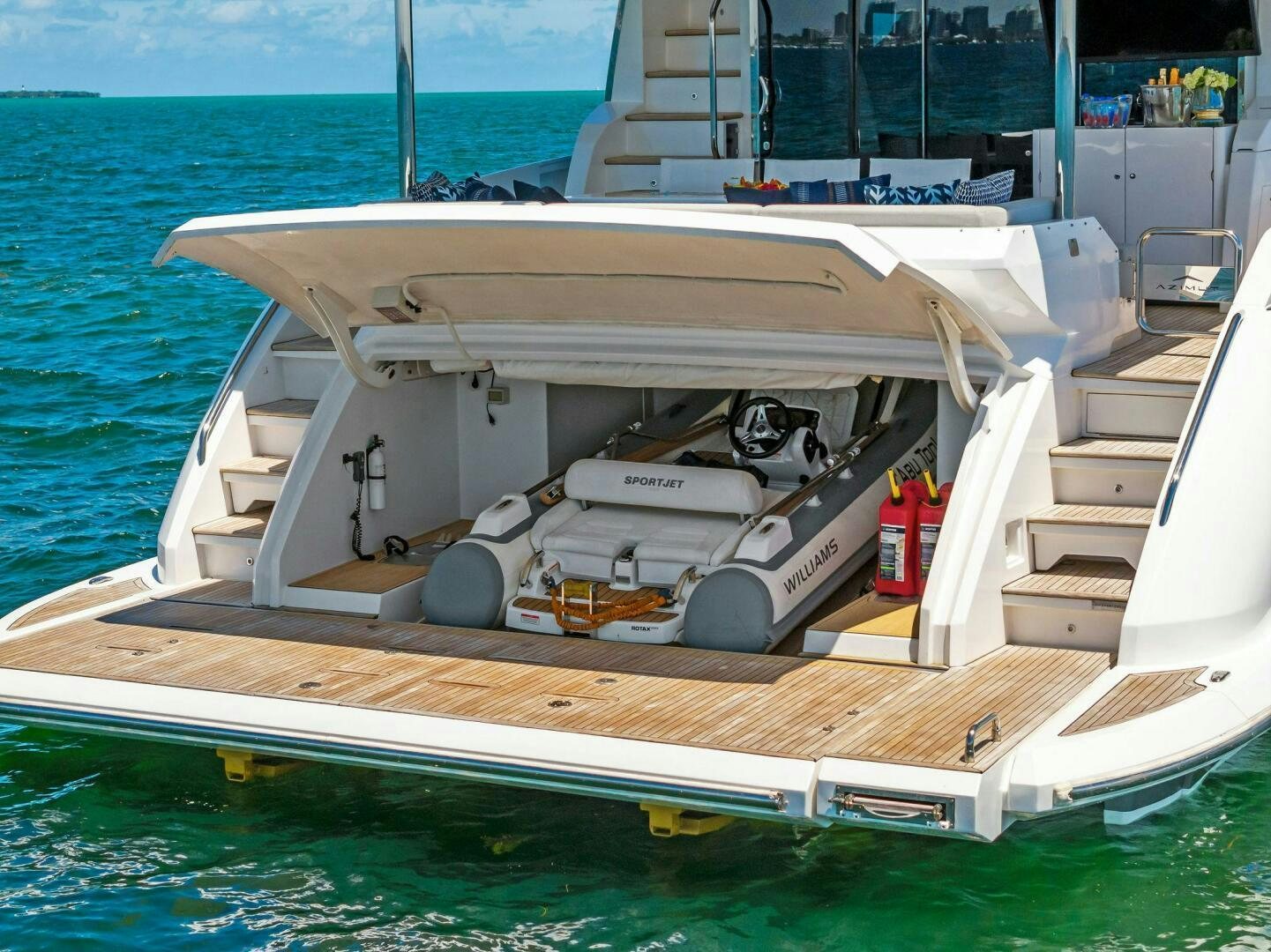 a boat with a motor on the deck aboard LIMITLESS Yacht for Sale