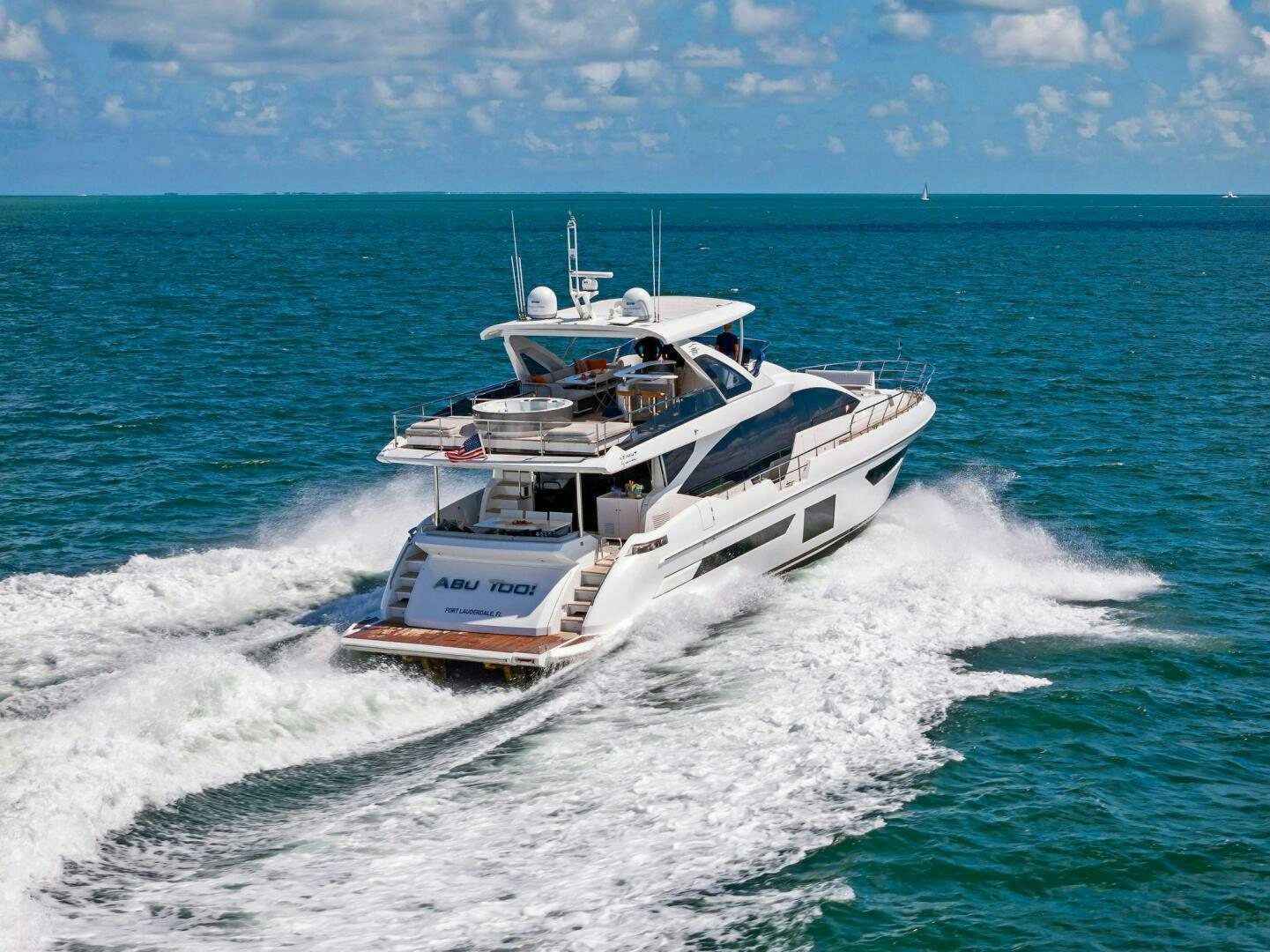 a boat on the water aboard LIMITLESS Yacht for Sale