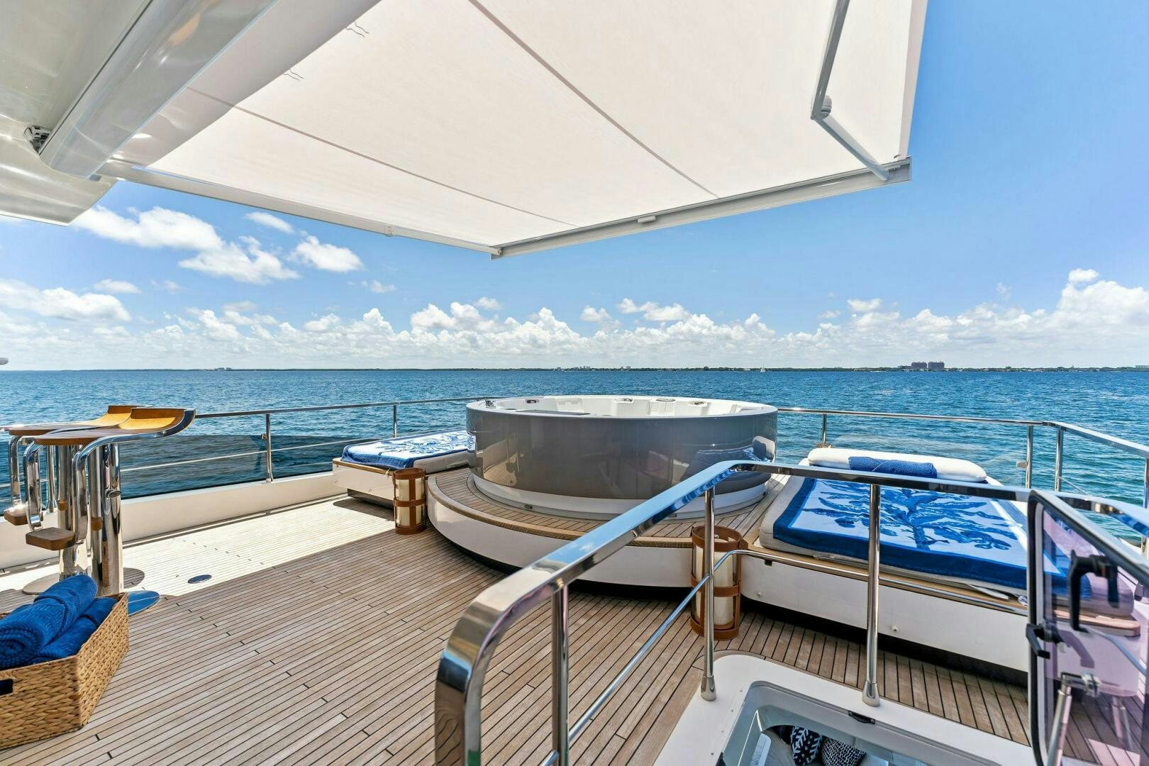 a boat on a deck aboard LIMITLESS Yacht for Sale
