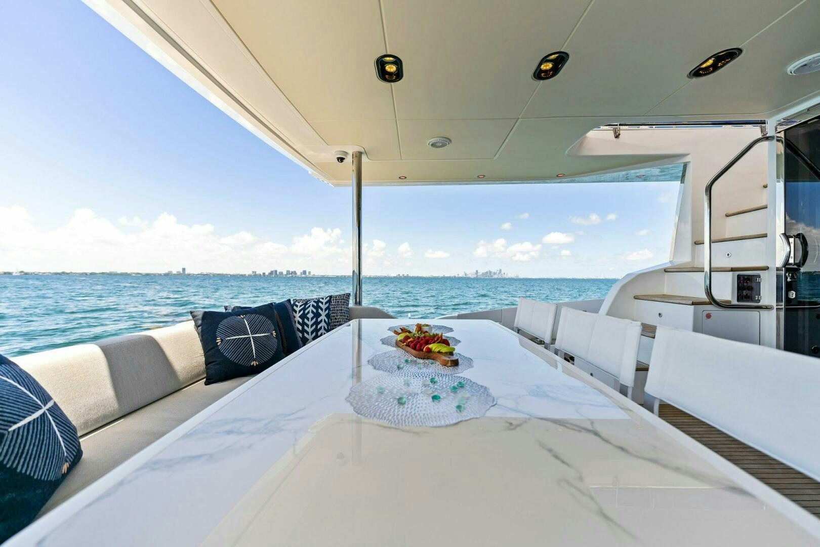 a table on a boat aboard LIMITLESS Yacht for Sale
