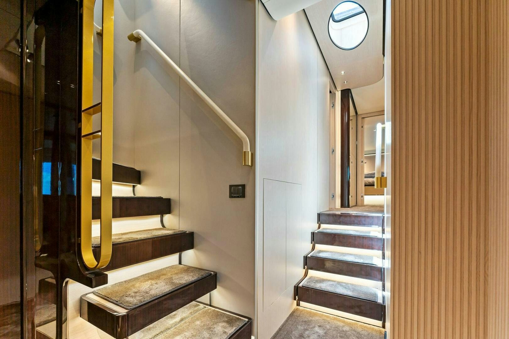 a staircase in a building aboard LIMITLESS Yacht for Sale