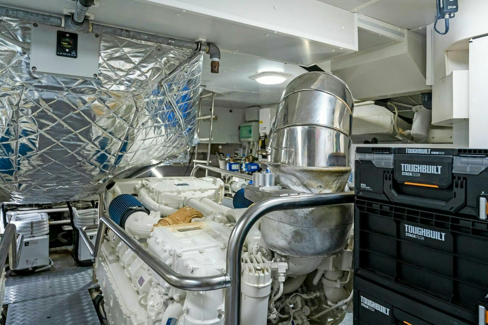 a large room with machines aboard LIMITLESS Yacht for Sale