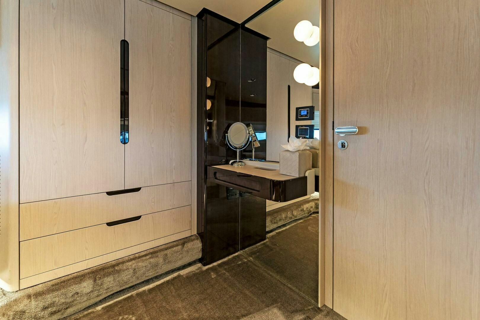 a bathroom with a mirror and a sink aboard LIMITLESS Yacht for Sale