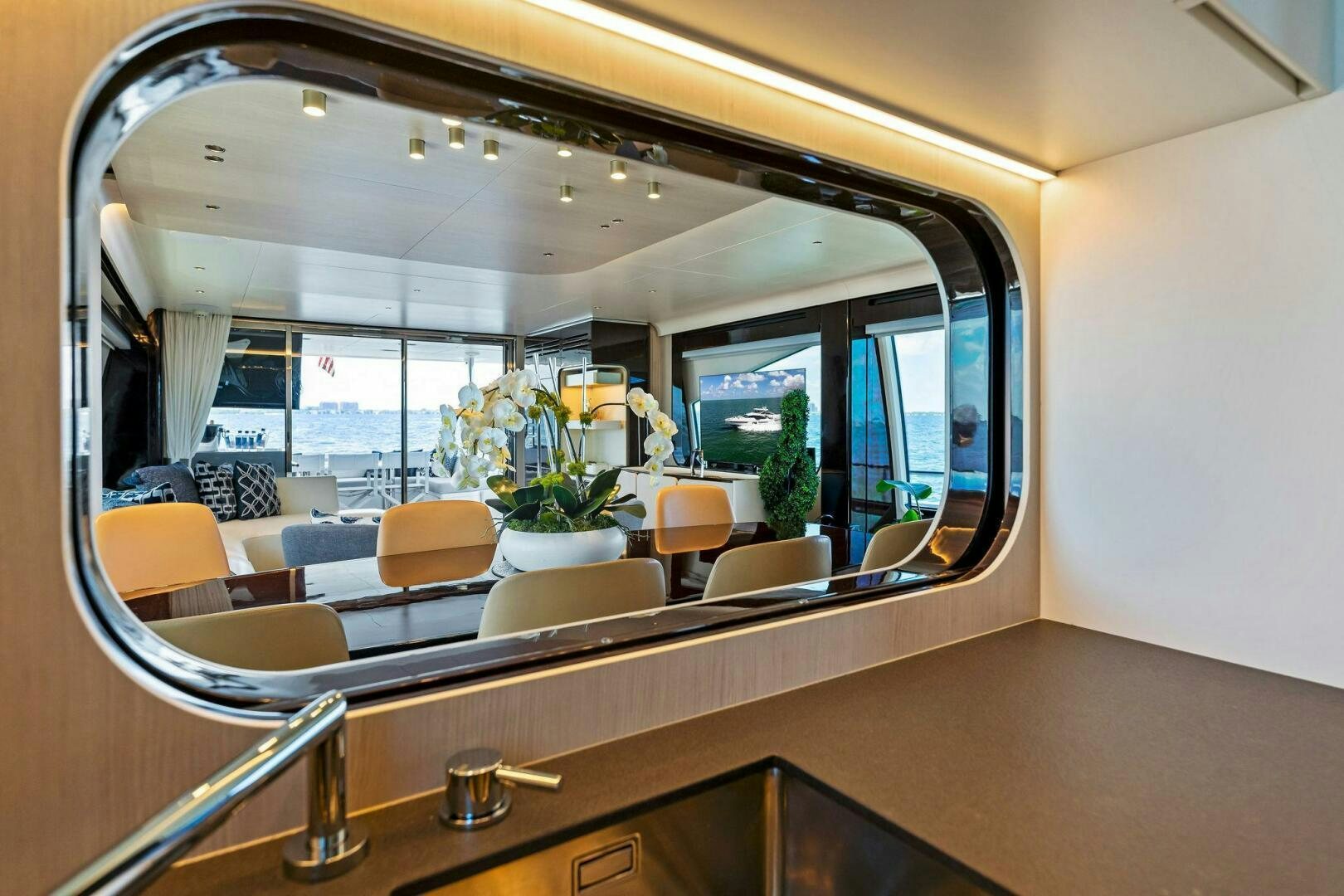 a room with a large window aboard LIMITLESS Yacht for Sale