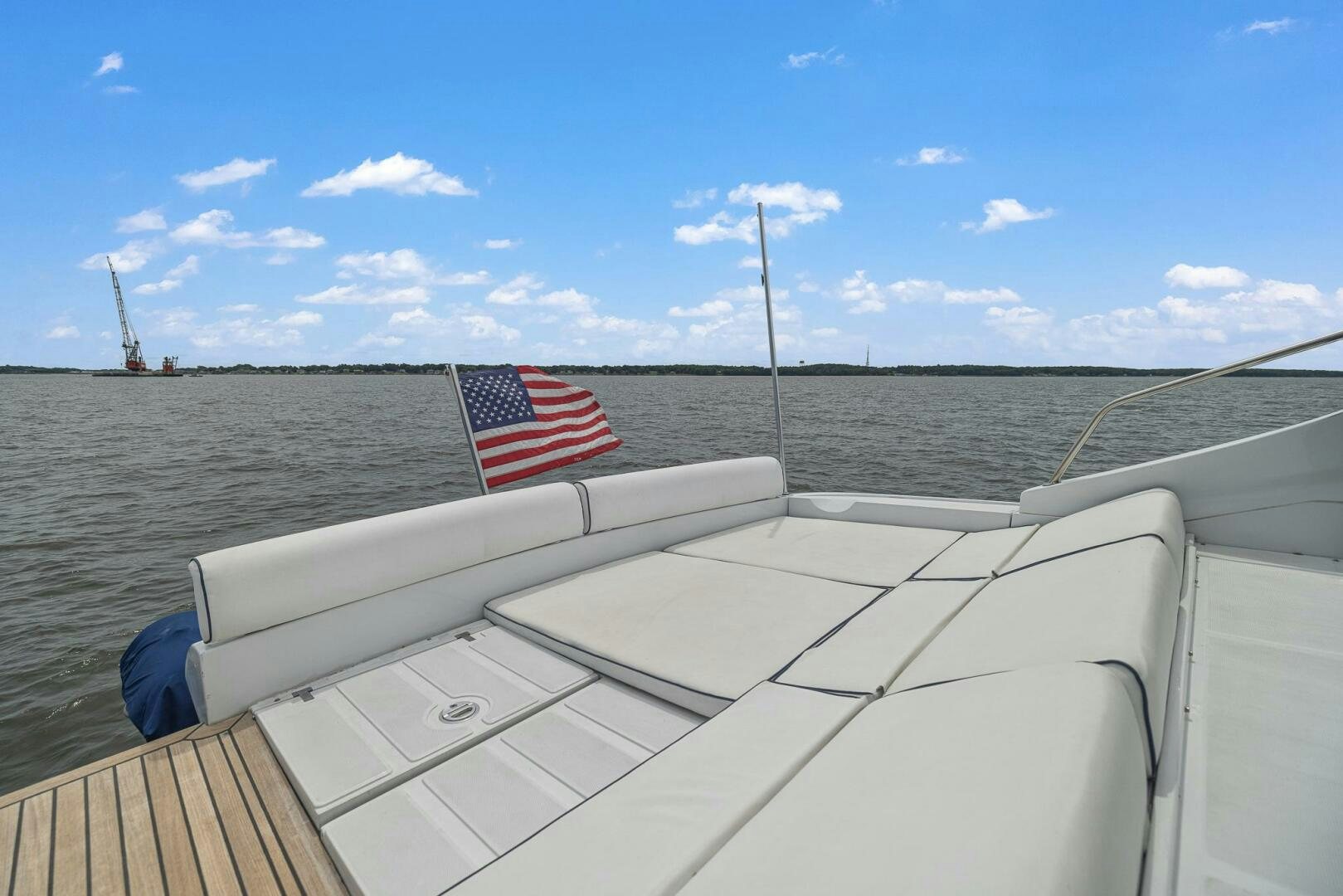 a flag on the back of a boat aboard ROOSTERTAIL Yacht for Sale