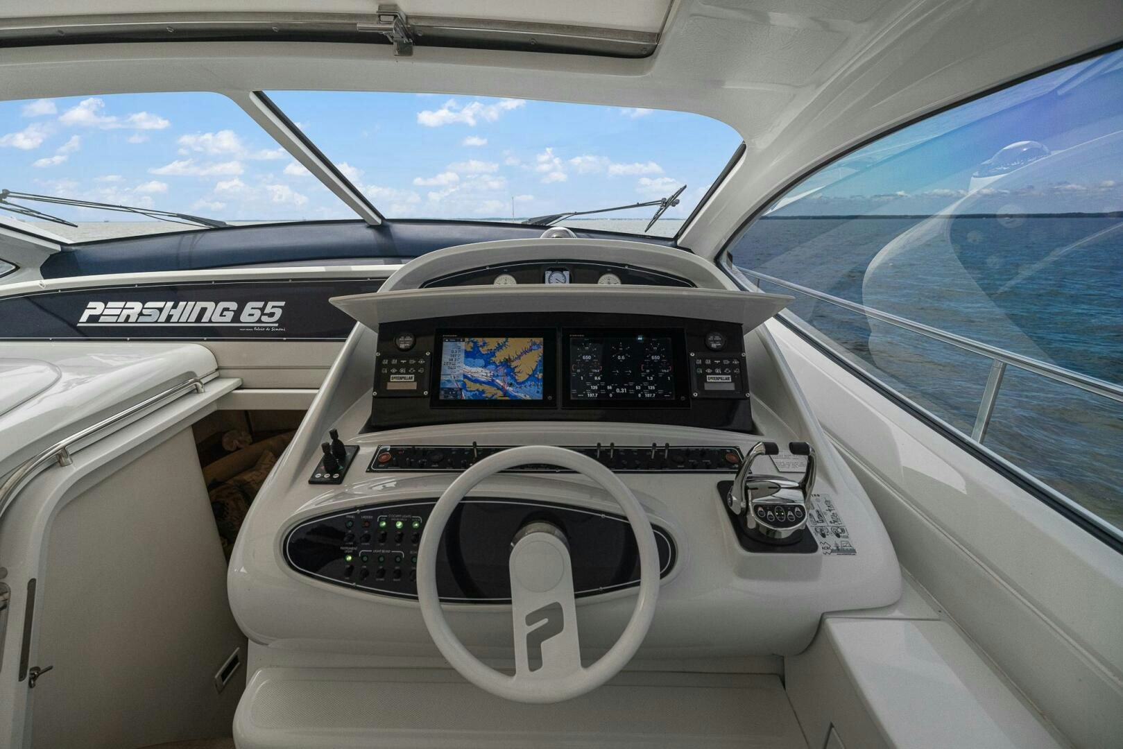 the interior of a car aboard ROOSTERTAIL Yacht for Sale