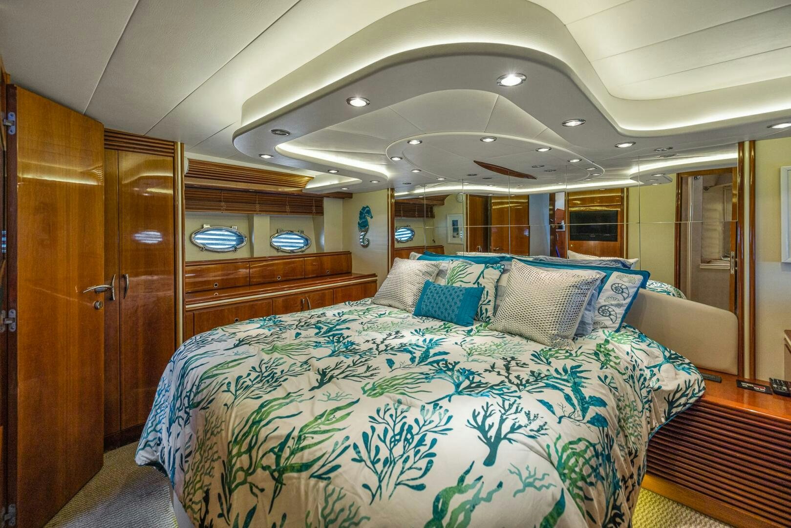 a bed in a room aboard ROOSTERTAIL Yacht for Sale