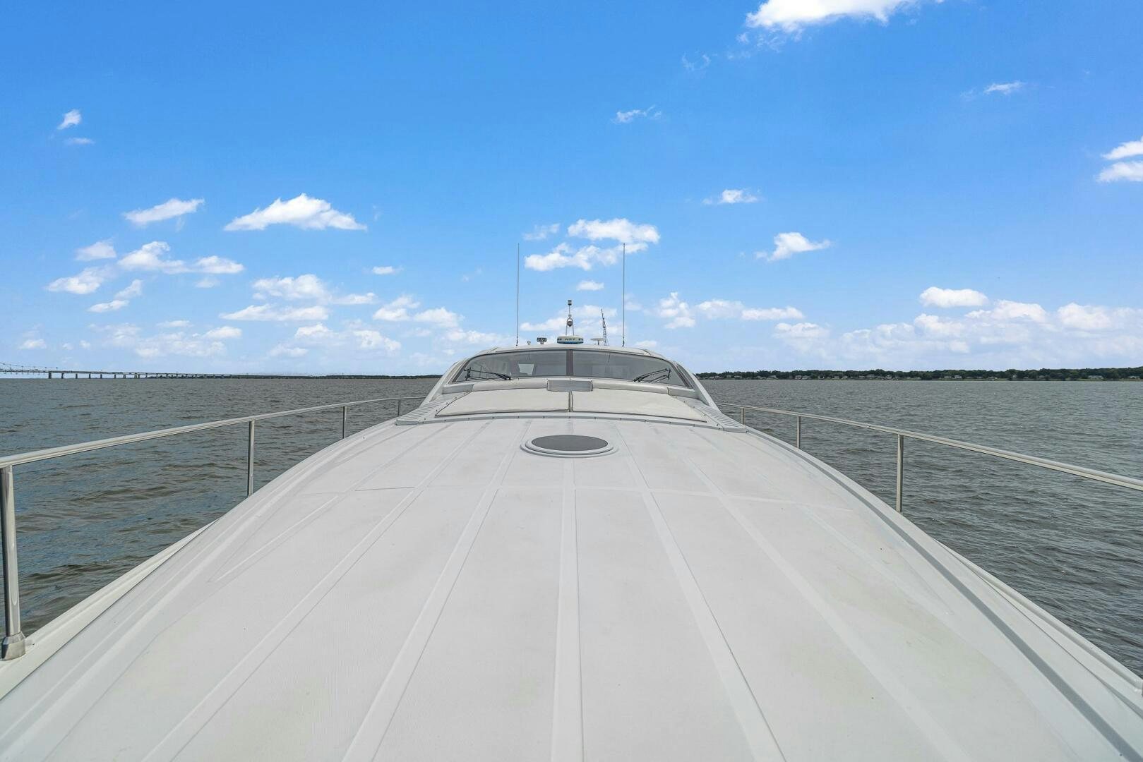 a long road with a bridge aboard ROOSTERTAIL Yacht for Sale