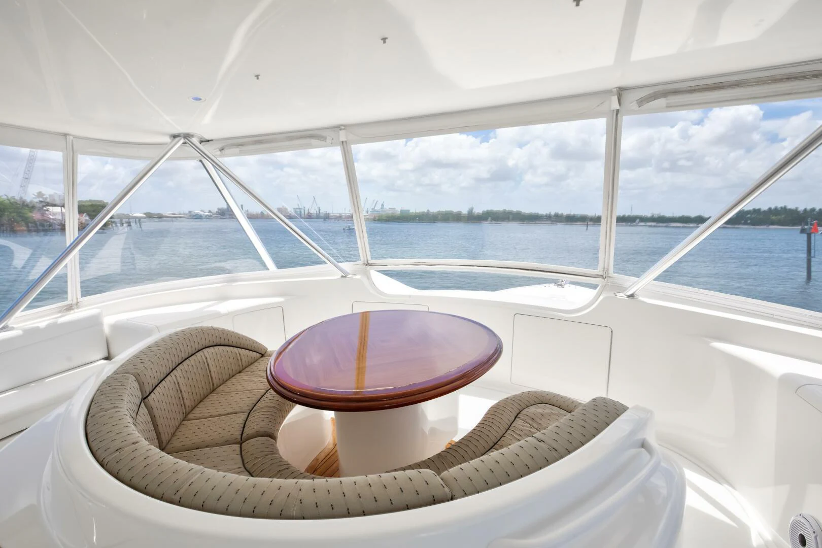 a boat with a round table on the front aboard DONE DEAL Yacht for Sale