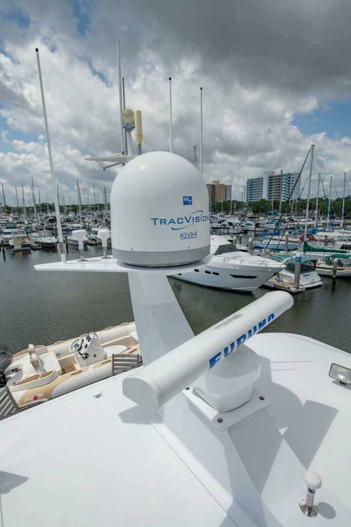 a white satellite dish on a boat aboard TIME-2 FLY Yacht for Sale