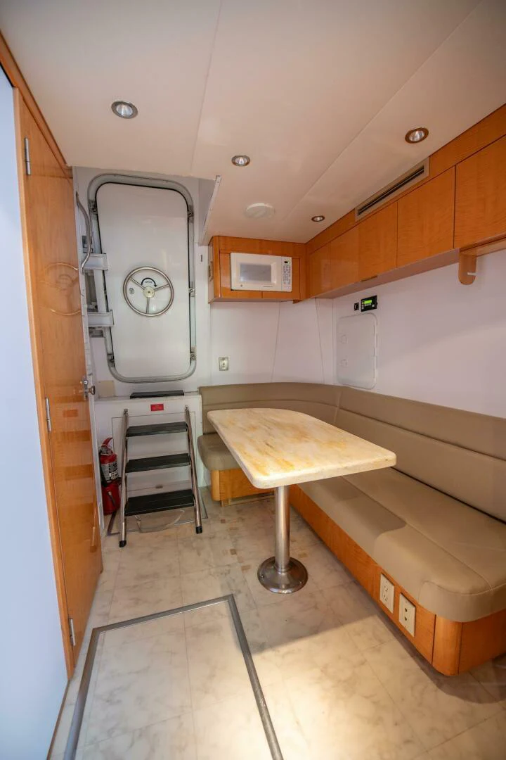 a room with a table and a machine aboard TIME-2 FLY Yacht for Sale
