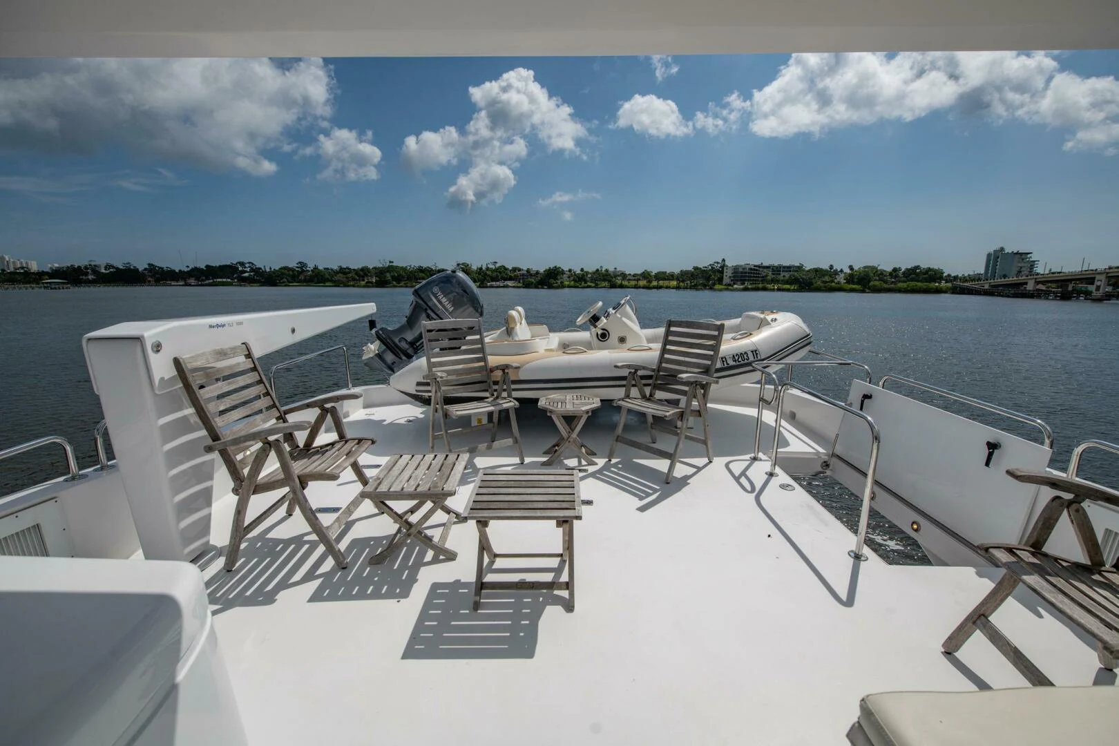 a group of chairs on a boat aboard TIME-2 FLY Yacht for Sale