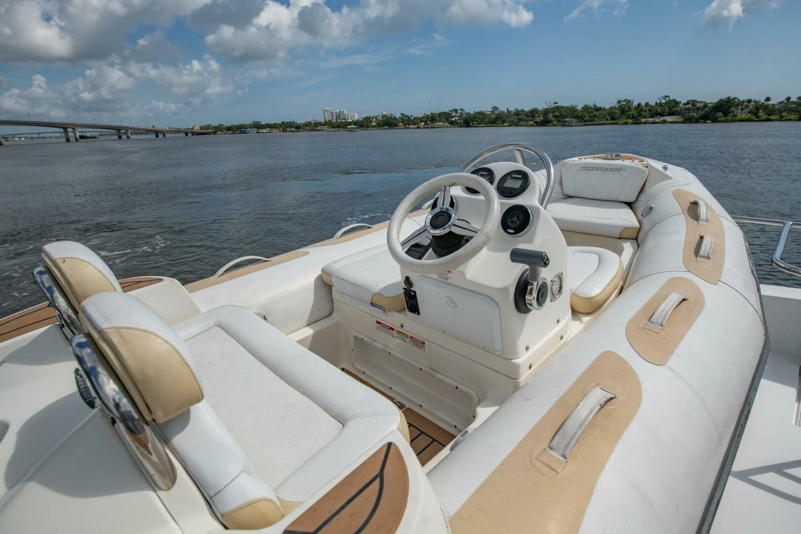 a boat with steering wheel and seats aboard TIME-2 FLY Yacht for Sale