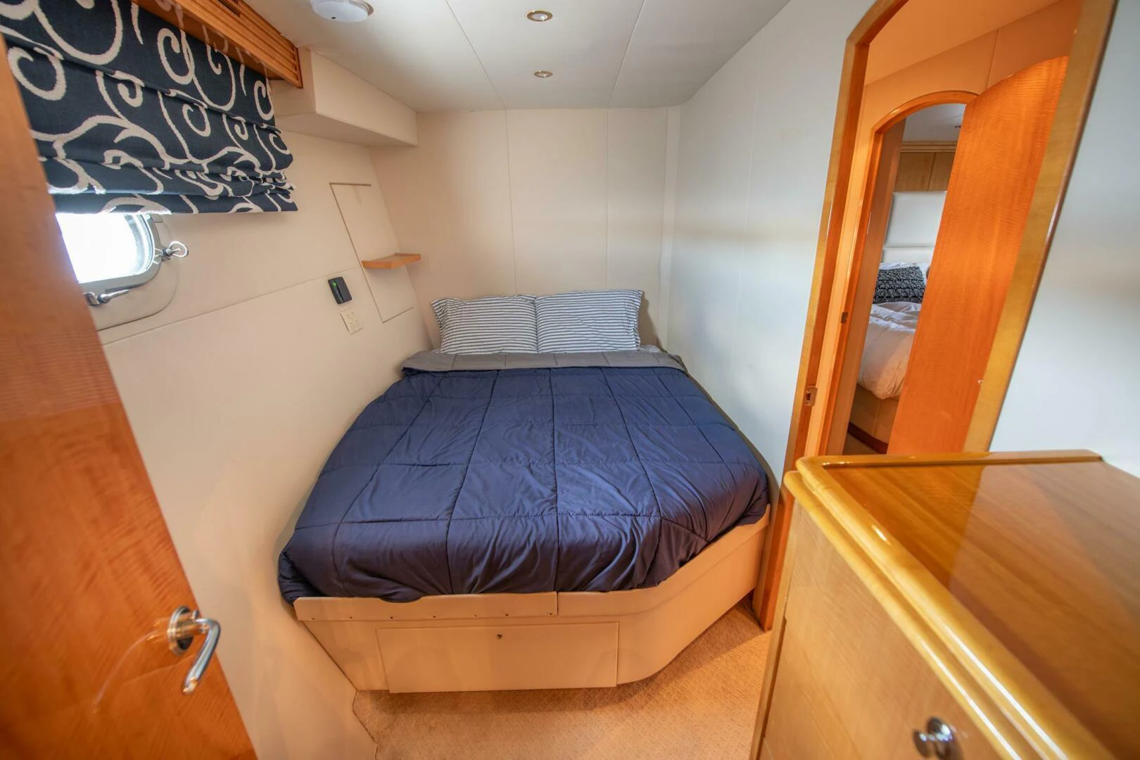a bed in a room aboard TIME-2 FLY Yacht for Sale