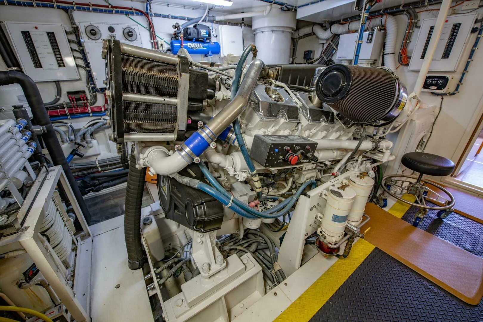 a machine with a large metal cylinder aboard TIME-2 FLY Yacht for Sale