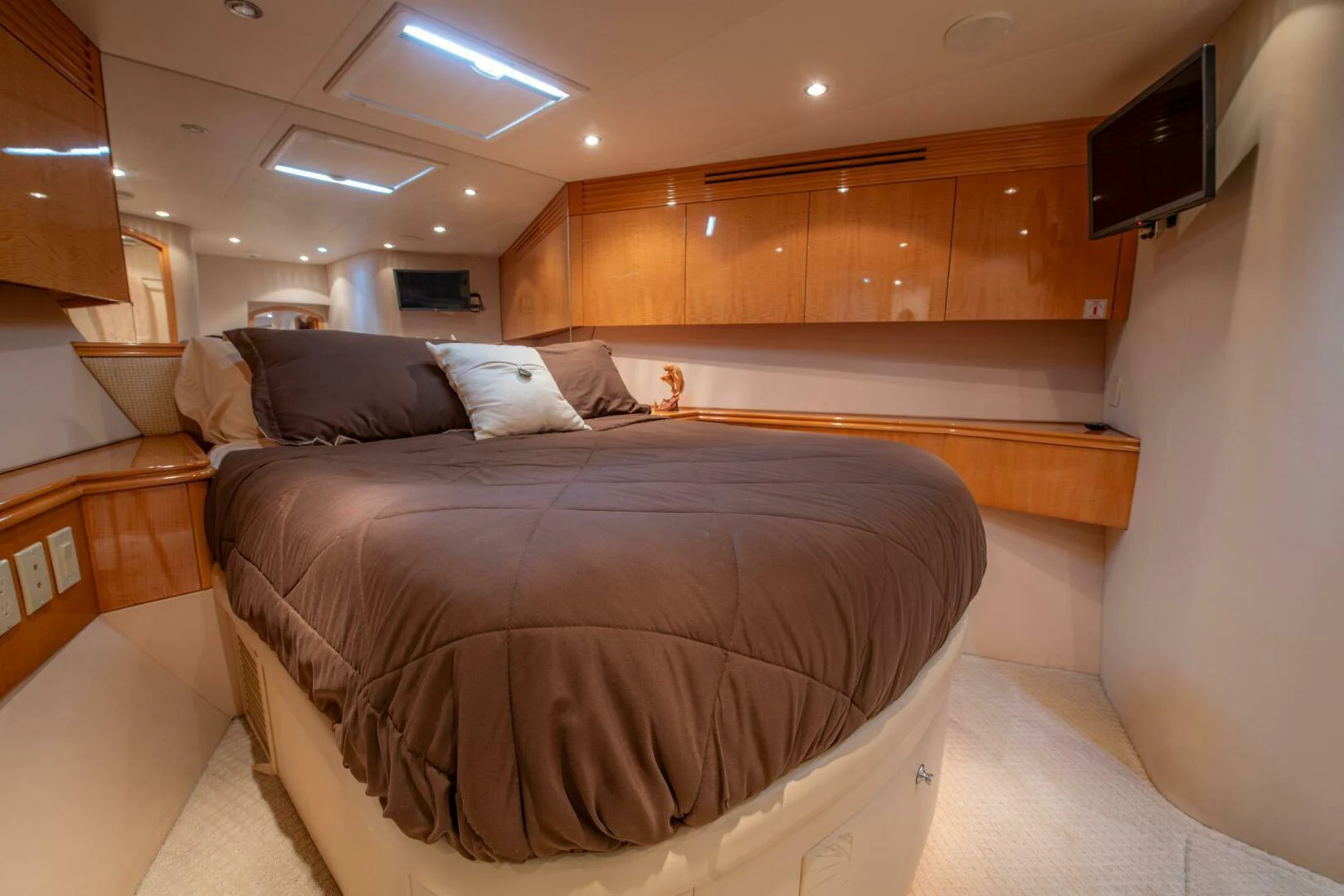 a person sleeping on a bed aboard TIME-2 FLY Yacht for Sale