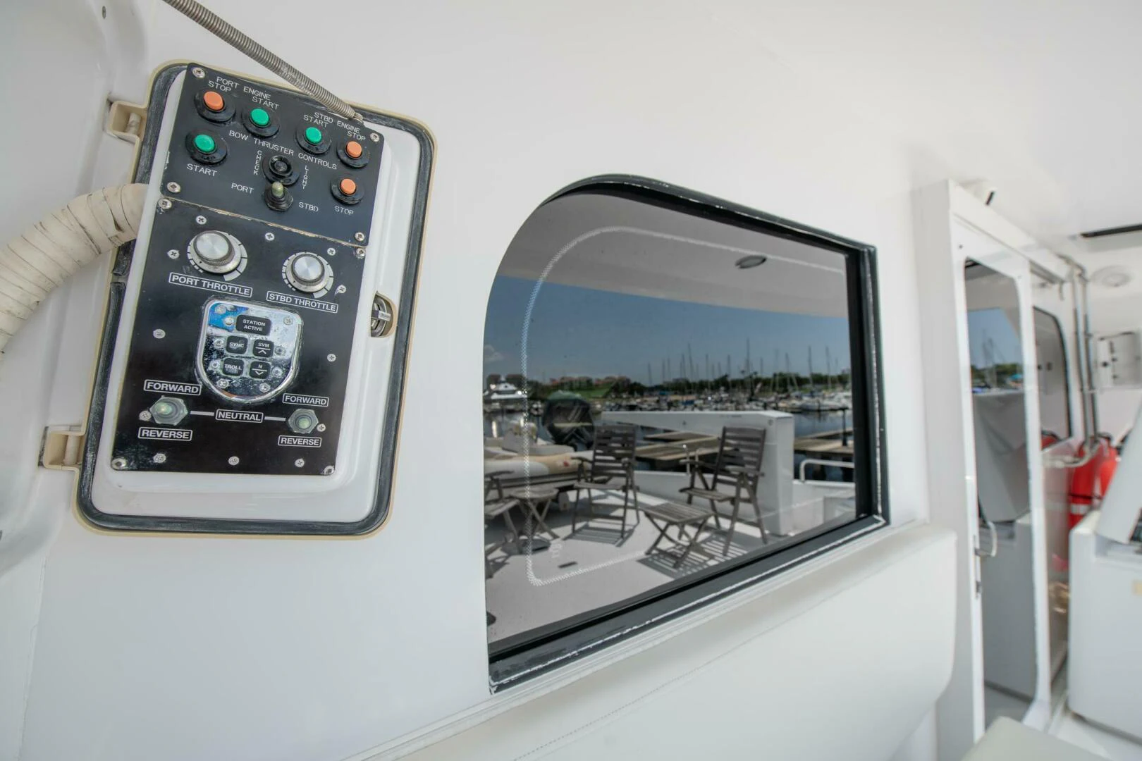 a video game console on a white table aboard TIME-2 FLY Yacht for Sale