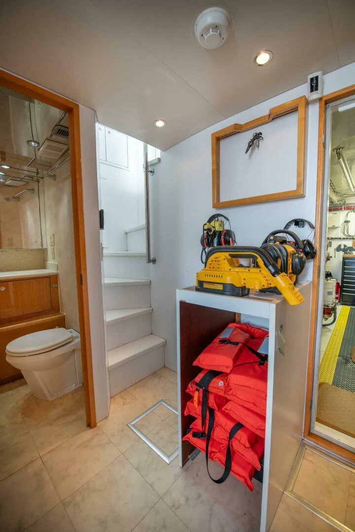 a bathroom with a toilet and a sink aboard TIME-2 FLY Yacht for Sale