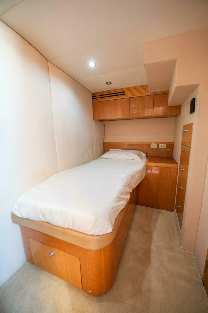 a bed in a room aboard TIME-2 FLY Yacht for Sale